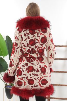 Winter Long Coat With Floral Embroidery, Traditional Red Winter Outerwear, Winter Floral Embroidery Long Coat, Winter Floral Embroidered Long Coat, Red Winter Outerwear With Intricate Embroidery, Red Intricately Embroidered Winter Outerwear, Traditional Winter Outerwear With Geometric Embroidery, Fitted Winter Outerwear With Geometric Embroidery, Fitted Winter Outerwear With Multicolor Embroidery