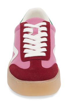 Squiggly side stripes and colorblocking energize this sporty sneaker set on a boosted, stacked midsole. Leather and synthetic upper/synthetic lining/rubber sole Imported Casual Multicolor Sneakers With Contrast Sole, Pink Leather Sneakers For Jogging, Pink Leather Jogging Sneakers, Color Block Lace-up Synthetic Sneakers, Trendy Color Block Sneakers, Trendy High-top Sneakers With Gum Sole For Sports, Trendy Sports Sneakers With Contrast Sole, Sporty Color Block Sneakers With Round Toe, Sporty Pink Leather Running Shoes