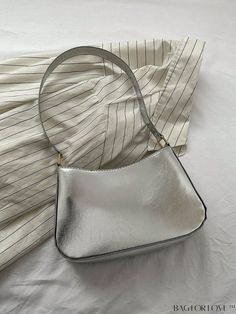 BagForLove - Compact Metallic Hobo Bag with Unique Styling Product Description Color Silver Type Square Bag Bag Size Small Pattern Type Plain Closure Type Zipper Strap Type Top Handle Style Minimalist Features Lightweight Material PU Leather Size Chart INCH CM Bag Length Bag Width Bag Height Handle Height 9.3 inch 2.2 inch 5.9 inch 10.6 inch Bag Length Bag Width Bag Height Handle Height 23.5 cm 5.5 cm 15 cm 27 cm Details Pictures Similar Products h2 { text-align: center; } /* æ¢è¡ */ li{ white Silver Baguette Bag For Shopping, Silver Baguette Shoulder Bag For Shopping, Silver Casual Shopping Bag, Casual Silver Shopping Bag, Casual Silver Bag For Shopping, Trendy Silver Tote Shoulder Bag, Trendy Silver Baguette Shoulder Bag, Silver Handheld Shoulder Bag For Everyday, Casual Silver Shoulder Bag For Shopping