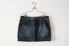 "Vintage Denim Jeans woman Skirt  Marks & Spencer brand from 1990s Fit like a \"XL\" Size: Waist 91 cm - 36\" Rise 37 cm - 14,5 The fit of items garments should always be determined by exact measurements, not the tag size. All measurements are taken with the garment lying flat/natural, not pulled taut. Your desired fit should be taken into consideration when comparing exact measurements. Condition: Excellent Vintage Condition - No noticeable stains, tears or holes. Vintage garment is 20+ years o 90s Cotton Denim Blue Denim Skirt, 90s Denim Blue Cotton Denim Skirt, 90s Denim Blue Cotton Skirt, 90s Style High-rise Cotton Denim Skirt, 90s High Rise Cotton Denim Skirt, 90s Style High Rise Cotton Denim Skirt, Woman Skirt, Streetwear Denim, Jeans Woman