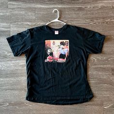 This Is A Brand New, Never Worn, Supreme X Antihero Tee. Black. Size Xl. Will Not Accept Lowball Offers. Vintage Black Shirt With Graphic Design, 90s Style Black Shirt With Graphic Print, 90s Style Black Short Sleeve Tops, Black Relaxed Fit 90s T-shirt, Black 90s Style Relaxed Fit T-shirt, 90s Style Black Relaxed Fit T-shirt, 90s Black Relaxed Fit T-shirt, 90s Style Black Screen Print Tops, Tee Shirts