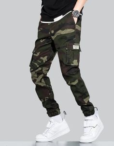 Streetwear Camo Pants Winter Functional Cargo Pants For Streetwear, Camouflage Cotton Joggers With Pockets, Streetwear Full Length Pants With Functional Pockets, Casual Winter Bottoms With Functional Pockets, Casual Bottoms With Functional Pockets For Winter, Streetwear Full Length Joggers With Pockets, Techwear Joggers With Multiple Pockets For Streetwear, Hip Hop Cargo Pants With Hip Pockets For Outdoor, Urban Cargo Pants For Winter