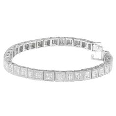 A modern geometric design gives this glamorous bracelet an undeniably bold look. Sprinkled with small, round diamonds inside chic cube links, this 14 karat white gold piece is nothing short of stunning.  (2.86 cttw, H-I Color, SI1-SI2 Clarity) Modern Diamond Bracelet With Baguette Cut Accents, Modern Baguette Cut Diamond Bracelet With Accents, Modern Baguette Cut Diamond Bracelet, Modern Diamond Bracelet With Single Cut Diamonds, Modern Silver Diamond Bracelet With Baguette Diamonds, Modern Diamond White Tennis Bracelet, Modern White Jubilee Tennis Bracelet, Modern Diamond White Diamond Bracelet With Diamond Cut, Modern Tennis Bracelet With Baguette Diamonds And Cubic Zirconia