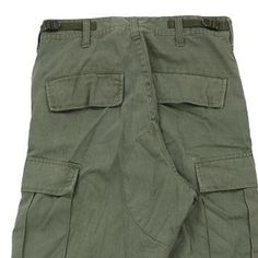 Description:Vintage Unbranded green cargo trousers, fit a UK size 8 - high waisted with a 26" waist. Size conversion: US Size: 4EU Size: 36IT Size: 40 RISE TYPE: High WaistedWAIST: 26 inches / 66cmsINSEAM: 32 inches / 81cmsRISE: 12 inches / 30cmsGENDER: womens CONDITION: very good.STYLE: cargo trousersERA: 1990sCOLOUR: greenFABRIC: cotton Combat Green Pants With Multiple Pockets, Green Combat Pants With Multiple Pockets, Vintage Khaki Cargo Bottoms, Green Military Cargo Pants With Hip Pockets, Green Cotton Combat Cargo Pants, High Waist Green Cargo Pants In Utility Style, High Waist Green Utility Cargo Pants, Vintage Green Cargo Pants With Pockets, Green High Waist Utility Cargo Pants