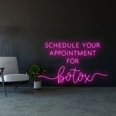 a neon sign that says schedule your appointment for boston on the wall next to a chair