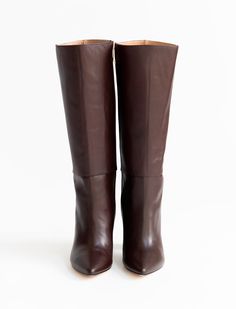 The Celina Boot is the quintessential tall boot. Featuring soft brown leather, a pointy toe, chunky heel and interior zipper, you'll want to get this boot in every color! 4 millimeter padding for a bit more comfort. Comes with dust bag. Runs small. Order one full size up. DETAILS 100% LeatherHandmade in MexicoTops measure 13.5 inches3.5 inche heel Tall Boot, Black Orchid, Soft Brown, Every Color, 5 Inch Heels, Zadig And Voltaire, Tall Boots, Chunky Heel, Brown Boots