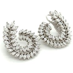 Adorn yourself lavishly with these exquisite statement earrings, crafted with 3.66carat total weight of striking marquise cut diamonds. Indulge in their magnetic shimmer and regal design to elevate any look and occasion into a truly luxurious experience. Each earring is 27mm in length 29mm width and the design is definitely statement making. Metal: 18K White GoldDiamond Weight: 78 Marquise Cut diamonds 3.66ct twBacking: Clasp Back Dimensions: 24mm x 24mm Regal Design, Marquise Cut Diamond, Earrings 3, Marquise Cut, White Gold Diamonds, Statement Earrings, Gold Diamond, Diamond Cuts, Fine Jewelry