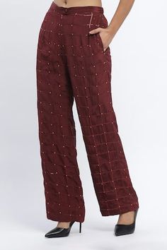 Burgundy trouser with all over dot chequered prints and sequin embroidery. - Aza Fashions Festive Embroidered Workwear Pants, Festive Embroidered Pants For Workwear, Festive Workwear Straight Pants, Festive Straight Pants For Workwear, Festive Cotton Bottoms For Workwear, Festive Traditional Workwear Bottoms, Festive Cotton Trousers, Festive Wide-leg Cotton Pants, Festive Wide Leg Cotton Pants