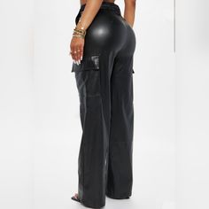 Flaunt Your Style With The Tina Cargo Pants! Made From Buttery-Soft Faux Leather And Featuring Four Functional Side Pockets, These Pants Are Perfect For Every Occasion. Comfort, Quality, And Sophistication These Pants Have It All! 95% Polyester 5% Spandex Full Length Leather Pants With Pockets, Fitted High Waist Leather Pants With Pockets, High Waist Pants With Cargo Pockets For Night Out, High-waisted Pants With Pockets For Night Out, Fitted Cargo Trousers For Night Out, Fitted Straight Cargo Pants For Night Out, Night Out High-waisted Pants With Pockets, High Waist Pants With Side Pockets For Night Out, Fitted Straight Leg Cargo Pants For Night Out