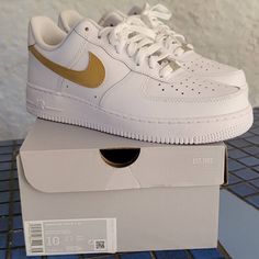 Brand New Never Worn Custom Painted Gold Swoosh White And Gold Nike Shoes, Nike Custom Low-top Gold Sneakers, Nike Custom Gold Low-top Sneakers, Gold Low-top Nike Custom Sneakers, White And Gold Shoes, Eras Outfits, Shoes Nike Air Force, Nike Air Women, Cycling Shoes Women