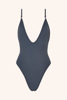 It’s our most iconic one-piece swimsuit. Whether you’re making waves or catching them, this plunging neckline one-piece in Emerald delivers confidence with every splash. It’s more than swimwear – it’s a fashion statement. Cut & Fit Shaping, sculpting fit Pulls on Plunging neckline High-cut style with medium coverage brief Hardware & Straps All gold hardware Adjustable shoulders straps Lining & Fabric Double-lined  84% polyamide, 16% elastane Model Measurements: Height 176 cm | Bust 8 Gooseberry Swimsuit, Royal Blue Swimsuit, One Piece Black Swimsuit, Grey One Piece, Gooseberry Intimates, Green One Piece Swimsuit, Monday Swimwear, One Piece Bathing Suits, Green One Piece