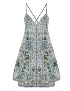 The Ottie Swing Mini Dress in Green Paisley from our Summer Swim 2024 Collection. A linen mini dress featuring a deep v-neckline and a low back with criss-cross straps, finished with a full skirt.