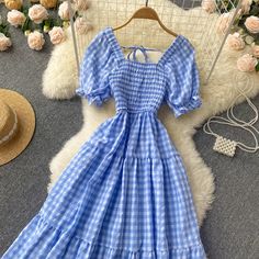 Trendy Blue A-line Dresses, Blue Non-stretch A-line Dress, Blue Non-stretch Midi Length Dress, Blue Non-stretch Midi Dress, Light Blue Non-stretch Beach Dress, Blue Sundress Midi Dress For Picnic, Blue Square Neck Dress For Picnic, Blue Non-stretch Sundress, Trendy Non-stretch Blue Dress