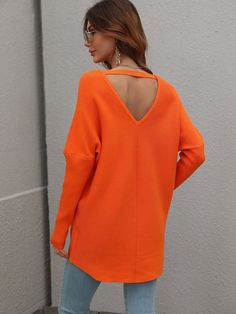 Our Clia Knit comes in a neon orange colour in an oversized drape fit. This features a heart neckline and open V back collar, batwing long fitted sleeves, and a roomy fit making this ideal for growing baby bumps. This piece is made from lightweight breathable material which is perfect for a trans-seasonal outfit. Pair with jeans for a lazy day outfit or complete the look with our Jady Rose Heels. Size Guide: Ambre is 5’2” tall, and has a 33.2” bust, 24.5”waist, & 36.7” hips. She is wearing a S / Oversized Sweater Women, Solid Color Sweater, Female Clothes, Asymmetrical Sweater, Long Sleeve Striped Top, Fashion Female, Knitted Top, Selling Clothes, Women Sleeve