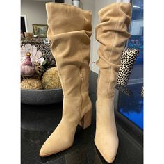 Your Cool Weather Wardrobe Will Get An Instant Upgrade With The Haimi Boot From Steve Madden. A Slouchy Suede Design Is Finished With A Stacked Block Heel And Pointed Toe For Added Tailored Appeal. Beige Boots With Branded Heel Counter, Cream High Heel Suede Boots, Elegant Beige Boots With Flat Heel, Elegant Beige Flat Heel Boots, Elegant Cream Suede Boots, Steve Madden Combat Boots, Steve Madden Slides, Leopard Print Booties, Tan Ankle Boots