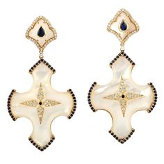 Hand cast from 18-karat gold, these stunning earrings are set with 1.2 carats blue sapphire, 31.34 carats pearl and .66 carats of glimmering diamonds. FOLLOW MEGHNA JEWELS storefront to view the latest collection & exclusive pieces. Meghna Jewels is proudly rated as a Top Seller on 1stdibs with 5 star customer reviews. All items manufactured by us are handmade and can be customized or redesigned. Composition Size-53x27 MM Total Weight-18.33 Gold Weight(Gms)-11.731 Diamond Wt(Cts)-0.66 Pearl Pearl Diamond Dangle Earrings, Art Deco Drop Earrings, Sapphire And Diamond Earrings, Freshwater Pearl Jewelry, Baroque Pearl Earrings, Diamond Dangle Earrings, Pearl And Diamond Earrings, Yellow Gold Jewelry, Art Nouveau Jewelry