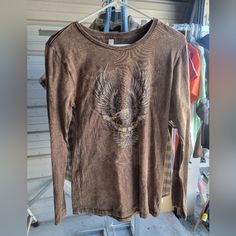 Women's Long Sleeve Tee Shirt. Great For Riding Or Just Wearing Every Day. Has An Eagle On The Front And Roses On The Sleeves. Brown In Color. From Jack's Custom Cycles In South Carolina Graphic Tee With Long Sleeve Underneath, Custom Cycles, Long Sleeve Tee Shirt, An Eagle, Long Sleeve Tee Shirts, Womens Long Sleeve Shirts, Long Sleeve Tees Women, Movie T Shirts, Brown Fashion