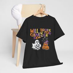 This Will trade Candy for Soccer Halloween Funny T-Shirt is perfect for those who love a good joke and enjoy the spirit of Halloween. It's a unisex shirt that adds a fun and playful element to any casual outfit. Ideal for Halloween parties and trick-or-treating adventures. Product features - Unisex Heavy Cotton Tee made from 100% cotton for year-round comfort - Shoulder tape stabilizes the back of the garment to prevent stretching - Knitted in one piece without side seams to reduce fabric waste - Ribbed knit collar without seam for elasticity and shape retention - Made with specially spun fibers for smooth fabric and vibrant printing Care instructions - Machine wash: warm (max 40C or 105F) - Tumble dry: medium - Do not iron - Do not dryclean Halloween Novelty T-shirt For Streetwear, Novelty Halloween T-shirt For Streetwear, Funny Halloween Streetwear T-shirt, Funny Halloween T-shirt For Streetwear, Funny Halloween T-shirt With Short Sleeves, Funny Halloween T-shirt With Letter Print, Halloween Fun T-shirt With Funny Text, Trick Or Treat Costume, Funny Soccer