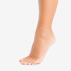 This Silver Treasures 14K Gold over Silver elephant ankle bracelet is designed for a trendy and comfortable wear. This anklet is featured in 14K gold over silver, 9 inches in length and has a lobster clasp closure for a comfortable wear. With the simple and sleek design, this anklet can be worn any time of the day and be trendy. Anklet can be wiped clean with a soft cloth.Features: Nickel FreeCircumference: 9 InchJewelry Closure: Lobster ClaspLink Construction: SemisolidShape: AnimalsMetal Colo… 14k Gold Anklets As Gift, Skin-friendly Gold Minimalist Anklet, Dainty 14k Gold Anklets, Silver Ankle Bracelet, Silver Elephant, Silver Elephants, Ankle Bracelet, Ankle Bracelets, Sleek Design