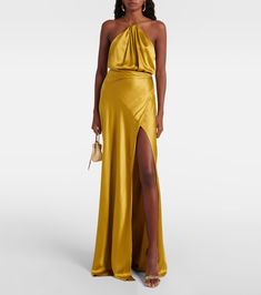 Draped silk gown in yellow - The Sei | Mytheresa Pre-draped Silk Evening Gown, Pre-draped Halter Neck Silk Maxi Dress, Pre-draped Silk Evening Maxi Dress, Formal Silk Maxi Gown, Silk Halter Neck Dress For Gala, Pre-draped Silk Evening Dress With Satin Finish, Silk Evening Dress With Bias Cut And Halter Neck, Silk Satin Dress With Back Opening For Evening, Pre-draped Silk Gala Dress