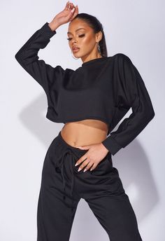 "Black Oversized Batwing Sleeve Crop Top & Jogger Lounge Set  Batwing Sleeve Crop Top Matching Joggers Regular Fit Fabric: 95% Polyester 5% Elastane Approx Length top is 42cm & joggers 96cm based on a UK size 10 Model is 5ft 7\" & wears UK size 8/EU size 38/US size 4/AUS size 8 Machine Washable In stock, dispatched within 1 day" Black Crew Neck Crop Top For Loungewear, Black Long Sleeve Crop Top For Loungewear, Black Batwing Sleeve Tops For Loungewear, Oversized Long Sleeve Crop Top For Loungewear, Size 10 Models, Ruffle Long Sleeve, Womens Pyjama Sets, White Tie, Lounge Set