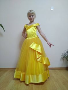 Unique yellow custom made girls dress with multi layered skirt from tulle and satin. Bodice made of satin. Cutaway collar dress. The back is decorated with a yellow satin bow. Zipper and lacing back. Colors: Yellow. Can be made any size and color. Yellow Satin Party Gown, Yellow Satin Gown For Party, Yellow Ball Gown For Party, Yellow Satin Evening Dress For Wedding, Yellow Princess Dress For Pageant, Elegant Yellow Princess Dress For Dress-up, Elegant Yellow Princess Dress For Pageant, Elegant Yellow Princess Dress For Wedding, Yellow Princess Wedding Gown