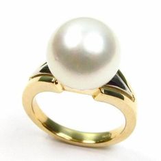 Absolutely gorgeous 100% authentic Australian South Sea white pearl ring in 14K two tone gold Pearl: 100% authentic top quality A grade (please refer to the below A-D pearl grading system for details.) Australian South Sea white pearl Pearl shape: round Pearl measurement: 11-12mm in diameter Luster: medium Nacre: greater than 0.8mm required by local law Color: white with possible pink or silver overtone Metal: selectable: 14K yellow gold, 14k white gold or 14K two tone gold (shown in the photo) Classic White Pearl Ring With Polished Finish, Formal White Rings With High Luster, High Luster White Rings For Formal Occasions, Formal White High Luster Rings, Formal White Pearl Ring With High Luster, High Luster White Pearl Ring For Anniversary, Formal White Pearl Ring With Polished Finish, White High Luster Pearl Ring, South Sea Pearl Ring