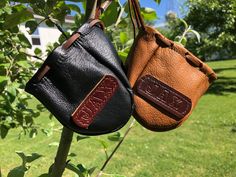 "This is a handmade leather coin pouch crafted for those who seek simplicity in their lives. This minimalistic pouch can fit perfectly in your pocket, backpack, purse, etc. We can STAMP your initials or your name (AS LONG AS YOUR NAME HAS 7 LETTERS OR LESS). During checkout, please, let us know what initials or name you would like us to stamp on your handmade leather coin pouch Measurements: +/- 4.5\" X 4\" X 3.5\" Colors: Black or Brown The high quality soft leather from Wisconsin creates the m Hand Tooled Leather Coin Purse For Gift, Handmade Leather Coin Purse For Personal Use, Leather Coin Pouch, Pouch Craft, Leather Drawstring Bags, Medieval Era, Pouch Handmade, Medicine Bag, Coin Pouch