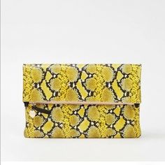 Chic Envelope Wallet With Removable Pouch, Chic Rectangular Wallet With Detachable Handle, Luxury Yellow Clutch Shoulder Bag, Chic Yellow Rectangular Clutch, Chic Travel Envelope Wallet, Yellow Clutch Shoulder Bag With Detachable Handle, Chic Envelope Travel Wallet, Travel Crossbody Clutch With Magnetic Closure, Chic Yellow Pouch Satchel