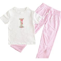 The cutest little pyjama set. With elasticated waist and secure drawstring bottom. Sizes available are: 3-4 years, 5-6 years, 7-8 years and 9-10 years. We recommend machine wash at 30 degrees, do not tumble dry. The applique design may crinkle, once dry it can be ironed flat and look as good as new. | My Little Shop UK | Liberty of London Children's Personalised Short Sleeve Pyjamas (White, Size 9-10Y) | Maisonette collects the best children’s products from around the world (unlike Zulily, Etsy, The Tot, Farfetch Kids, Childrensalon, Crate and Kids, Kohls, Wayfair, Buy Buy Baby, Nordstroms, Mini Boden, J.Crew Factory, or PotteryBarn Kids), creating a curated shopping experience for you. Think of us as your shortcut to fashion for litte ones! Family Matching Cotton Sleepwear For Sleepovers, White Cotton Pajama Party Sets, Matching Sets For Spring Pajama Party, Matching Spring Bedtime Sets, Family Matching Cotton Sets For Sleepovers, Playful White Cotton Sleepwear, Matching White Sets For Sleepover, Matching Cotton Sleep Sets, Cotton Matching Sleep Sets