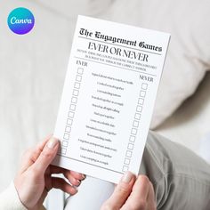 a person holding a paper with the words'the engagement games'written on it