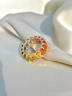 Rainbow Sapphire Ring, 14K Solid Gold, Multicolor Sapphire, Eternity Band Ring, Rainbow Gemstone Ring, Multicolor Band Ring, Gift For Her Diri Jewels 1. Material Details ✧ Gold KT: 14K Solid Gold ✧ Gold Color Options: Yellow Gold, White Gold, Rose Gold ✧ Gemstones: Natural Multi Sapphire (11.00 CTS - final carat weight will depend on ring size) ✧ Natural Diamonds: H-I VS-SI (0.75 CTS - final carat weight will depend on ring size) 2. Shipping & Packaging Details ☐ Dispatches in 4 - 8 business day Luxury Multicolor Cluster Ring As Gift, Multicolor Diamond Ring, Multicolor Oval Ring With Prong Setting, Oval Multicolor Ring With Prong Setting, Multicolor Diamond Rings With Prong Setting, Multicolor Halo Rings Fine Jewelry, Multicolor Gemstone Diamond Ring For Anniversary, Multicolor Oval Diamond Ring For Anniversary, Multicolor Fine Jewelry Ring For Anniversary