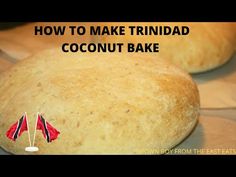 two loaves of bread sitting on top of each other with the words how to make trindad coconut bake