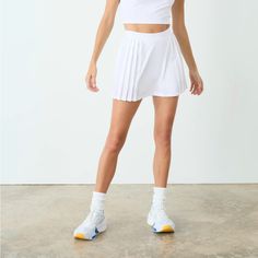 New W Tags Tennis Skirt Casual Spring Tennis Skirt With Built-in Shorts, Casual Pleated Skirt With Built-in Shorts For Spring, Chic White Skirt With Built-in Shorts, Spring Mini Pleated Skirt With Built-in Shorts, White Skirt With Built-in Shorts For Day Out, White Mini Skirt With Built-in Shorts, Sporty Summer Pleated Mini Skirt, Sporty Flowy Mini Skirt Bottoms, Sporty Summer Flowy Mini Skirt