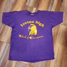 "Vintage single stitch Fresno high school, school of champions t shirt. Excellent used condition with minimal wear. Sized as a large fits more like a medium. Shirt is purple in color Measures: 21\" pit to pit 24\" shoulder to hem B02" T Shirt Womens, School School, Purple And Yellow, Vintage Purple, Graphic Tees Women, Long Sleeve Sweatshirts, Womens Clothing Tops, High School, Violet