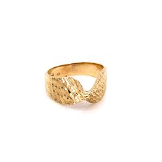 1980's Vintage 14k yellow gold statement ring. The ring is a size 6.75 and can be sized. The height of the ring off of the finger is 5.9mm. The width of the ring is 8.4mm. The ring weighs 3.76 of gold. Vintage 14k Gold Wide Band Ring, Hallmarked 14k Gold Wide Band Ring, Formal 14k Yellow Gold Wide Band Ring, 14k Yellow Gold Wide Band Open Ring, 14k Yellow Gold Open Wide Band Ring, Gold Open Band Ring Stamped 14k, Formal 14k Gold Dome Ring With Open Band, Formal 14k Gold Wide Band Ring, Gold Rings With Open Band Stamped 14k