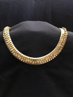 "1940/1950 Gold Toned Egyptian Revival Type Necklace - has rhinestones lined up in the middle of the necklace and the rhinestones stand up in a 3D fashion - necklace is 17\" long - has patina on the back - heavy and lays well - great statement piece - normal wear and scratches" Vintage Jeweled Choker Necklace, Vintage Necklace With Diamond Accents For Evening, Antique Rhinestone Necklaces For Formal Occasions, Vintage Formal Necklaces With Diamond Accents, Vintage Rhinestone Choker For Party, Formal Rhinestone Choker Necklace With Bling, Evening Rhinestone Necklace With Diamond Accents, Antique Jeweled Necklaces For Party, Vintage Metal Rhinestone Necklace With Jewels