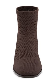 An open-knit upper with a close socklike fit is contrasted by the covered suede block heel of this ventilated bootie fitted with a padded footbed. 1 3/4" heel 4 1/2" shaft Pull-on style Textile and leather upper/leather lining/synthetic sole Imported Sock Bootie, Suede Block Heels, Fabric Gift Bags, Open Knit, Nordstrom Store, Free Fabric, Eileen Fisher, Print Gifts, Bootie