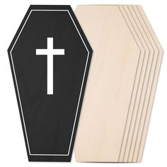 a set of six wooden crosses with black and white border