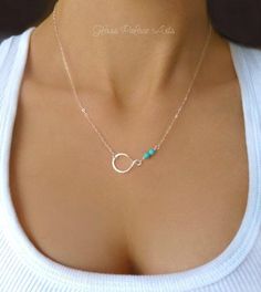 "* D E T A I L S * Small Beaded Silver Turquoise Necklace * Available in Gold or Sterling Silver A simple and dainty infinity necklace * So simple and modern! * 24k gold vermeil or sterling silver small infinity link * 20mm * Genuine dainty and genuine turquoise faceted beads * Chain is a shimmery 14k gold filled or sterling silver chain * Loop has a tiny stamp of authenticity of sterling or 24k gold metal on one side * Total necklace length shown at 18\" * Model has a size small neck * Necklace Bijoux Fil Aluminium, Modern Necklace, Turquoise Pendant Necklace, Real Turquoise, Infinity Necklace, Solitaire Necklaces, Necklace Simple, Bijoux Diy, Turquoise Pendant