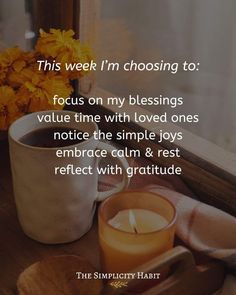 a candle and some flowers sitting on a window sill with the words, this week i'm choosing to focus on my blessing value time with loved ones notice