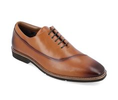 A classic oxford with an asymmetrical detail for a modern twist, the Odin by Thomas & Vine. This genuine leather dress shoe features a 6 mm Tru Comfort Foam™ footbed and an ExtraLight® outsole for extra support and comfort. Supple genuine leather and a lace-up closure finish this upscale look. Genuine Leather upper, Lace-up closure for secure fit,1\ heel, Round toe, Tru Comfort Foam™ insole for all day comfort, EVA (Ethylene Vinyl Acetate) outsole, Elastic gusset allows for comfort and ease, Cus Thomas Vines, Oxford Shoes Brown, Foams Shoes, Oxford Dress Shoes, Oxford Shoes Men, Leather Dress Shoes, Dress Shoe, Round Toe Heels, Lace Up Heels