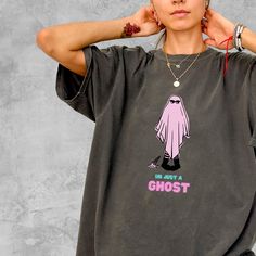 Embrace the spooky season with our "I'm Just a Ghost" T-Shirt, a cute and stylish addition to any Halloween wardrobe. Crafted from premium Comfort Colors fabric, this tee offers unmatched comfort and quality, making it the perfect Halloween gift for her! Why You'll Love This T-Shirt 🌟: 👻 Adorable Halloween Design: Features the sweet and simple phrase "I'm Just a Ghost" that adds a touch of fun and whimsy to your Halloween celebrations. 🌿 Sustainably Made: Crafted with 100% ethically sourced U Funny Halloween T-shirt For Streetwear, Funny Halloween Streetwear T-shirt, Halloween Novelty T-shirt For Streetwear, Novelty Halloween T-shirt For Streetwear, Spooky Funny Print T-shirt For Streetwear, Spooky Funny Print Streetwear T-shirt, Halloween Grunge T-shirt With Character Print, Grunge T-shirt With Character Print For Halloween, Grunge Halloween T-shirt With Funny Print