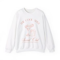 Calling all new Aunties! It's your turn to join The Cool Aunt Social Club. Our stylish graphic sweatshirt is the PERFECT gift for your Aunt or to share an exciting new baby announcement. She will be delighted to receive this high quality crewneck from her niece or nephew. It's the ideal gift for your favorite Cool Aunt.  This classic, unisex crewneck will fit like a well-loved favorite from its first wear. Our ultra soft Gildan crewnecks feature... - Medium weight fabric with a 50/50 cotton & polyester blend - Tear away label and no side seams - True to size fit - available in a range of sizes! Questions about sizing? Please refer to the size chart included in our listings! Wish you could customise this item? Don't hesitate to contact me! I'm always happy to help you find the colour or des White Letter Print Sweater For Spring, White Graphic Print Sweater For Loungewear, Graphic Print Sweatshirt For Spring Loungewear, Crew Neck Loungewear Tops With Logo Print, Logo Print Crew Neck Tops For Loungewear, Logo Print Crew Neck Sweater For Loungewear, White Cotton Sweats With Letter Print, Winter Loungewear Sweatshirt With Screen Print, Crew Neck Tops With Logo Print For Loungewear