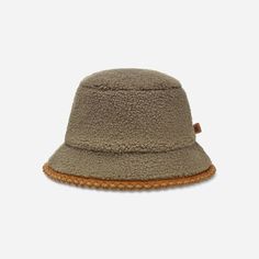 The UGG®fluff Scalloped Hat blends texture with plush fleece and playful scallop trim. | Plush fleece bucket hat. Self - 100% Polyester. Plush fleece Lining - 100% Polyester. Features a scalloped trim on brim. Leather label with Graphic UGG® Font. Imported. | UGG® Women's UGG®fluff Scalloped Hat Fleece Hats in Moss Green, Size S/M Casual Brimmed Hat With Plush Lining, Casual Brimmed Hat With Faux Fur Lining, Casual Adjustable Hat With Plush Lining, Casual Adjustable Hats With Plush Lining, Casual Fleece-lined Hat With Curved Brim, Casual Hat With Fleece Lining And Curved Brim, Casual Hats With Fleece Lining And Curved Brim, Casual Curved Brim Hat With Fleece Lining, Winter Outdoor Brown Bucket Hat