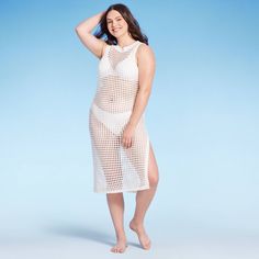 This Crochet Cover-Up Midi Dress from Shade & Shore™ will keep you looking and feeling your best before and after swimming. Made from breathable 100% cotton in an off-white hue, this crochet cover-up dress features a slightly sheer construction with holes to show off the stylish swimsuit you're wearing underneath. Designed in a midi length, it's the perfect pick for beach vacations or days spent relaxing by the pool. Shade & Shore™: Found exclusively at Target. White Cotton Cover-up For Poolside, White Cotton Poolside Cover-up, White Cotton Cover-up For Warm Weather, White Stretch Dress For Beach Party, White Crochet Dress For Poolside In Spring, White Crochet Dress For Poolside Spring Events, White Stretch Beachy Cover-up, White Crochet Dress For Poolside Spring Occasion, White Crochet Dress For Poolside And Beach Season