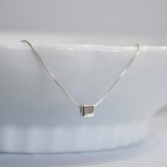 Sterling Silver Cube Necklace Sterling Silver by alexandreasjewels White Gold Charm Necklaces With Box Chain For Gift, White Gold Charm Necklace With Box Chain As Gift, White Gold Box Chain Charm Necklace For Gift, Silver Rectangular Charm Necklace With Delicate Chain, Sterling Silver Charm Necklace With Square Pendant, Silver Rectangular Necklace Gift For Her, Silver Rectangular Necklace For Her, Rectangular Silver Necklace For Her, Silver Charm Necklace With Square Pendant And Delicate Chain