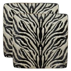 two black and white zebra print plates