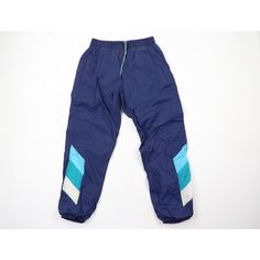 Vintage 90s Streetwear Mens Medium Distressed Color Block Lined Nylon Joggers Mens Pants Blemishes on the color blocks on the right leg Mens size Medium  Measurements are: 14 inches across the waist laid flat 30 inch inseam 40 inches from top to bottom Blue Nylon US Shipping is FREE, Canada is $15 and International is $24 Check out my other items in my store! PR466 90s Style Cargo Pants For Streetwear, 90s Style Nylon Sports Pants, 90s Style Sports Pants With Pockets, 90s Nylon Parachute Pants For Streetwear, 90s Blue Parachute Pants For Streetwear, 90s Sporty Pants With Pockets, 90s Style Nylon Bottoms For Streetwear, Blue Windbreaker, Lined Pants