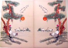 an open book with two pictures of birds and trees on the cover, one is red